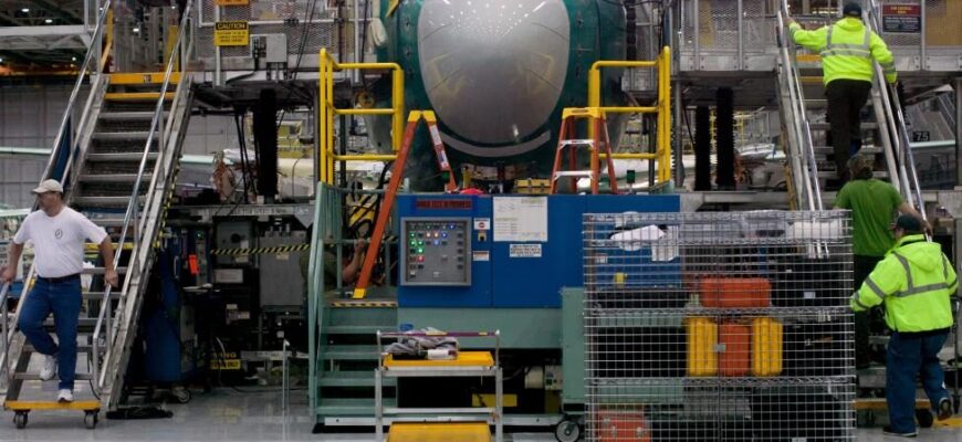 boeing-employees-march-up-and-down-stairs-entering-and-exiting-boeing-737-max-during-a-media-tour-of-the-boeing-737-max-at-the-boeing-plant-in-renton-washington