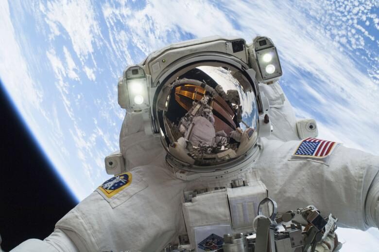 nasa-handout-of-astronaut-hopkins-participating-in-the-second-of-two-spacewalks