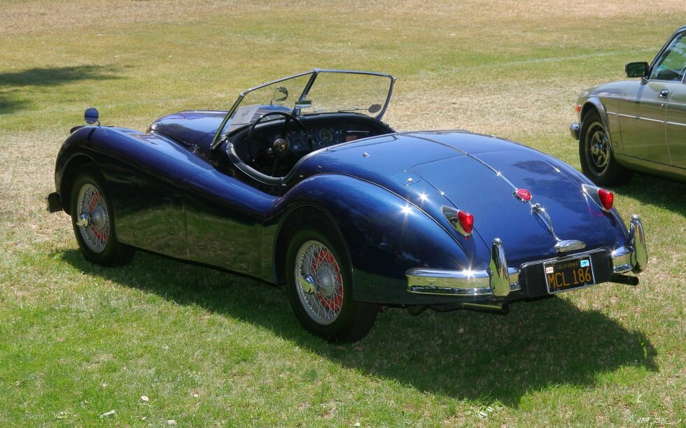 8. Jaguar XK140 1954 года.